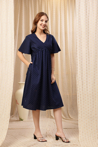 Woman wearing All Over Printed Concealed Zip Feeding Maternity Dress in Navy Blue - Pre & Post Pregnancy