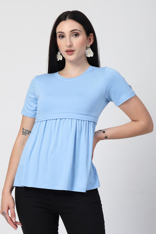 Styling detail of Ice Blue Maternity Zipless Feeding Gathered Top, highlighting aqua-blue print and Maternity Tops design.