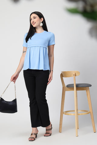 Side or angle view of Ice Blue Maternity Zipless Feeding Gathered Top showing the Maternity Tops silhouette and fit.