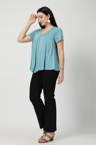 Styling detail of Sea Green Front & Back Pleated Zipless Nursing Top, highlighting light-sea-green print and Maternity Tops design