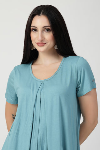 Side or angle view of Sea Green Front & Back Pleated Zipless Nursing Top showing the Maternity Tops silhouette and fit.