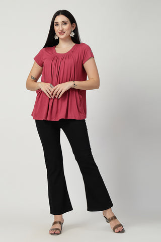 Close-up texture of Dusty Rose Pleated Zipless Nursing Top in dusty-pink, showing the soft Viscose fabric.