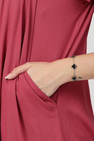 Styling detail of Dusty Rose Pleated Zipless Nursing Top, highlighting dusty-pink print and Maternity Tops design.