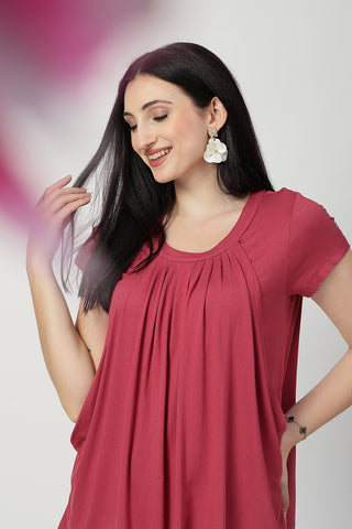 Side or angle view of Dusty Rose Pleated Zipless Nursing Top showing the Maternity Tops silhouette and fit.