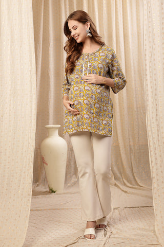 Yellow Embroidered Neck; embroidery adds style to the maternity top.