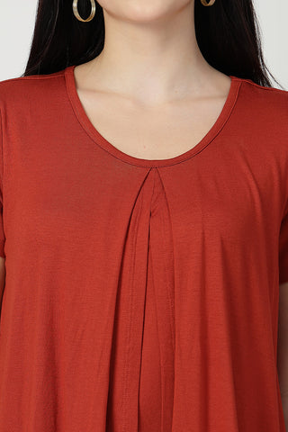 Interior view of Rust Front & Back Pleated Zipless Nursing Top showing Zipless.