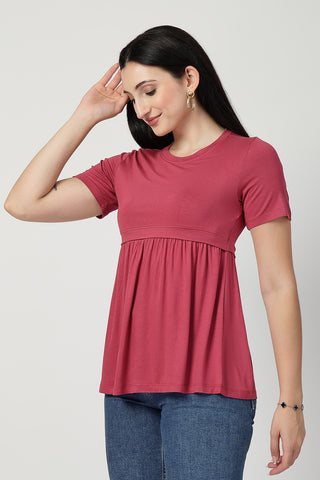 Smooth back view of dusty-pink Maternity Tops showing silhouette for comfort.