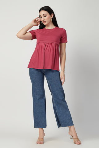 Side or angle view of Dusty Rose Maternity Zipless Feeding Gathered Top showing the Maternity Tops silhouette and fit.