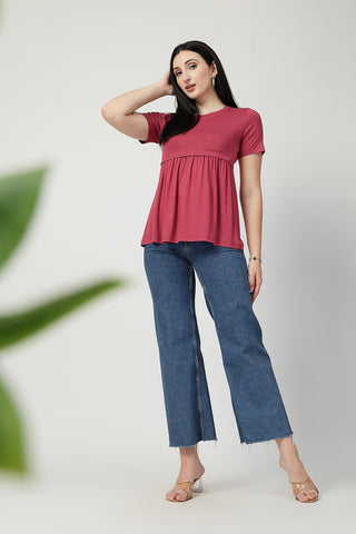 Styling detail of Dusty Rose Maternity Zipless Feeding Gathered Top, highlighting dusty-pink print and Maternity Tops design.