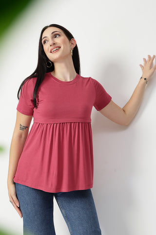 Detailed view of Dusty Rose Maternity Zipless Feeding Gathered Top Zipless access and Viscose construction.