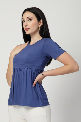Smooth back view of ditsy-blue Maternity Tops showing silhouette for comfort.