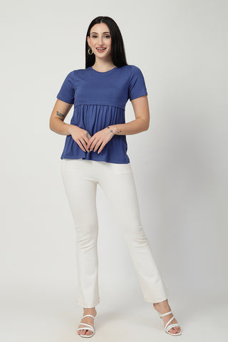 Side or angle view of Denim Blue Maternity Zipless Feeding Gathered Top showing the Maternity Tops silhouette and fit.