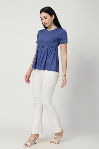 Close-up texture of Denim Blue Maternity Zipless Feeding Gathered Top in ditsy-blue, showing the soft Viscose fabric.