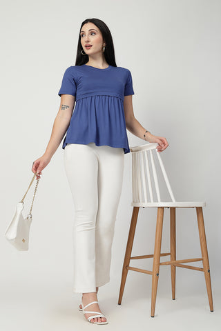 Styling detail of Denim Blue Maternity Zipless Feeding Gathered Top, highlighting ditsy-blue print and Maternity Tops design.