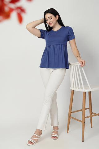Detailed view of Denim Blue Maternity Zipless Feeding Gathered Top Zipless access and Viscose construction.