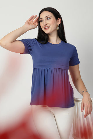 Side or angle view of Denim Blue Maternity Zipless Feeding Gathered Top showing the Maternity Tops silhouette and fit.
