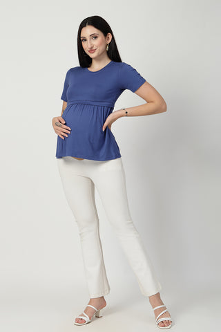 Close-up texture of Denim Blue Maternity Zipless Feeding Gathered Top in ditsy-blue, showing the soft Viscose fabric.