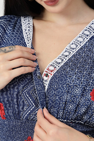 Model wears blue-with-floral-print Maternity Tops; stylish maternity fit with Zipless function.