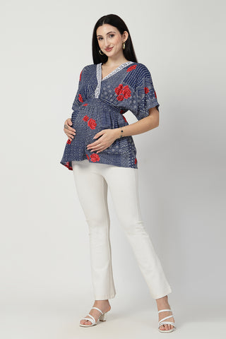 Detail shot of Rayon fabric; shows stretch and blue-with-floral-print color/print.