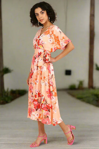 https://houseofzelena.com/collections/maternity-dresses/products/peach-fizz-floral-zipless-maternity-wrap-dress-with-kimono-sleeves