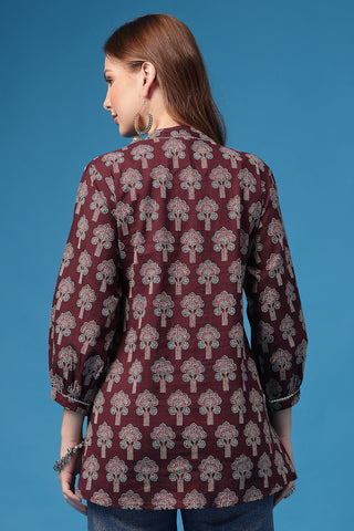 Plum Top pleat detail; gathers create flow and fit for a growing body.