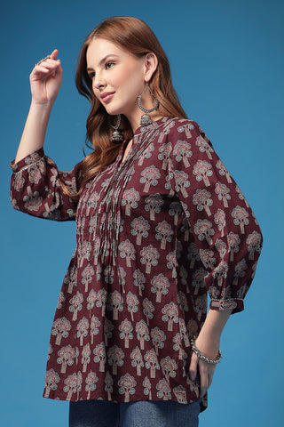 Plum Top print; all over pattern enhances the garment design.