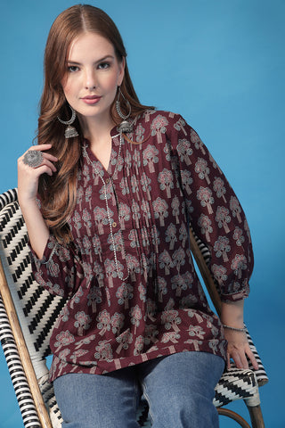 Plum Top; pleated design accommodates body changes during pregnancy and nursing.