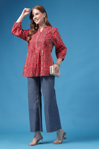 Red Top; lightweight material is soft on skin and flowy.