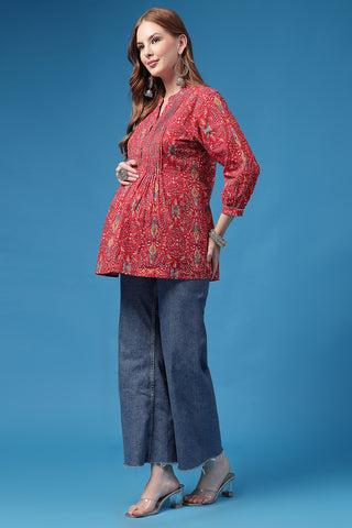 Model wearing Red Pleated Top; back view shows garment length and coverage.