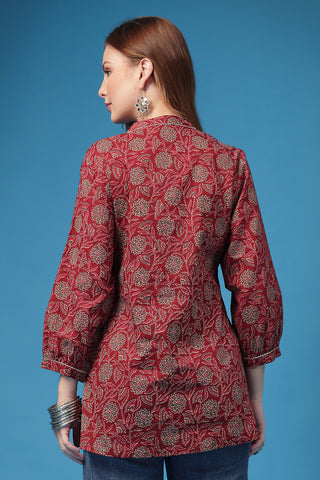 Burgundy Top pleat detail; gathers create flow and fit for a growing body.