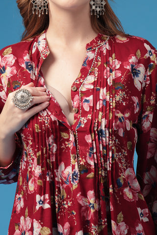 Model wearing Dark Maroon Pleated Top; garment provides coverage and fit for a changing body.