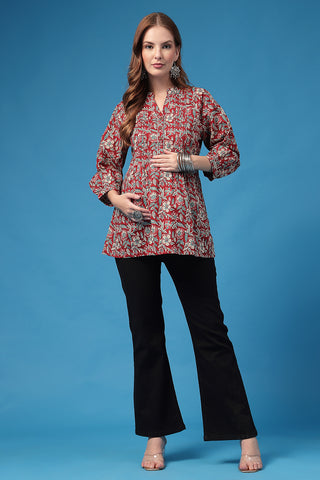 Multi Top pleat detail; pleats add shape and comfort to the maternity top.