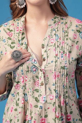 Model wearing Light Pink Top; garment provides coverage and fit for a changing body.