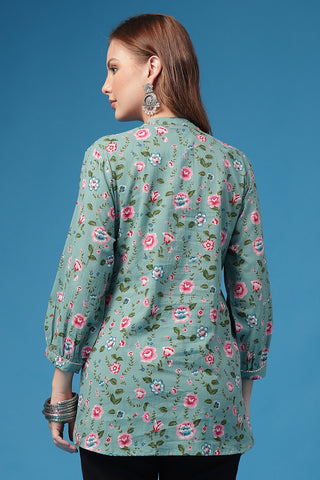 Light Green Top pleat detail; gathers create flow and fit for a growing body.