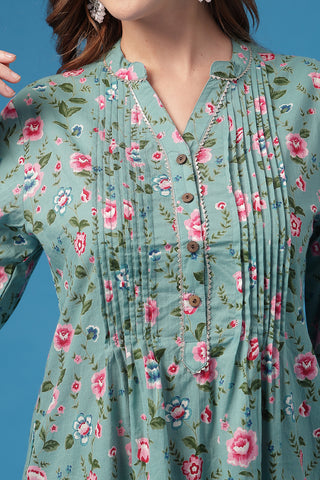 Light Green Top; pleated design accommodates body changes during pregnancy and nursing.