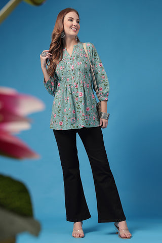 Light Green Printed Top; all over print provides a stylish look.