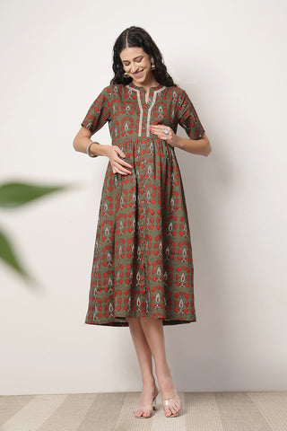 https://houseofzelena.com/collections/new-arrivals/products/mehr-the-festive-zipless-feeding-lapel-dress-bottle-green