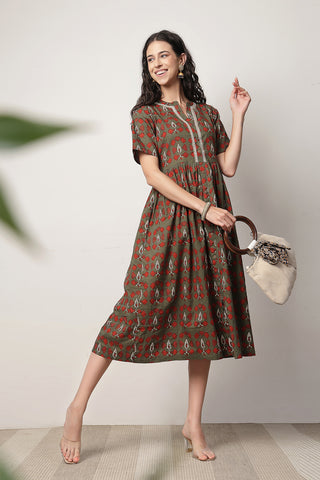 Detail of Hidden Feeding Zips & Pockets on Mehr – The Festive Zipless Feeding Lapel Dress- Bottle Green for