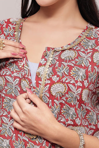 Model wearing Red Multi Top; provides coverage and fit for a changing body.