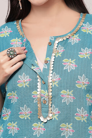 Model wearing Teal Booty Top; garment provides coverage and fit for a changing body.