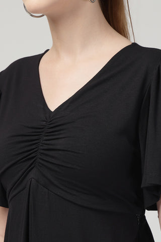 New mom wearing black Maternity Tops; shows flattering post-delivery fit and Zip.
