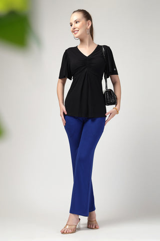 Close-up texture of Feeding top with in-built bra - Black in black, showing the soft Viscose fabric.