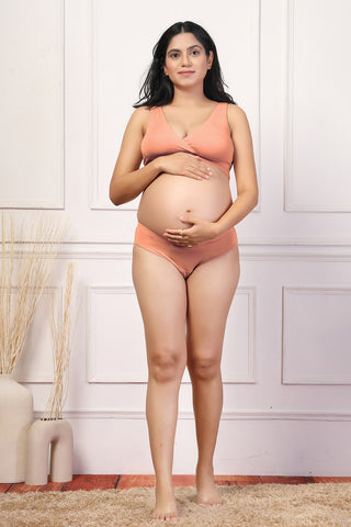 Model wearing Peach Padded Bra; overlapped scoop neck provides a smooth profile.