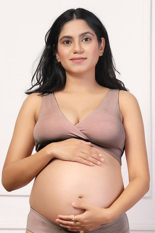 Back view shows wide supportive straps and hook-and-eye closure for fit.