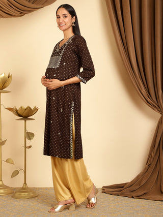 Styled look of the Brown sequins embroidered maternity kurti Kurti with matching pants and accessories.