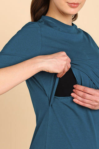 Model wearing Airforce Top; garment provides coverage and fit for a changing body.