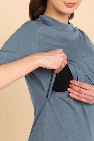 Model wearing M-Blue Top; garment provides coverage and fit for a changing body.