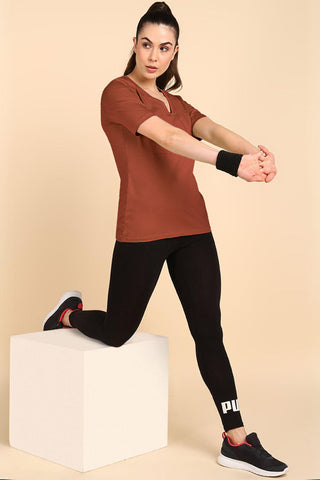 247 Zactive Rust Zipless Maternity Feeding Top - Front view showing breathable fabric and practical nursing access.