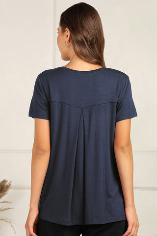 Navy Top back pleat; pleats add comfort and structure.