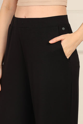Model wearing Black Pajama; high waist design provides coverage and support for the abdomen.